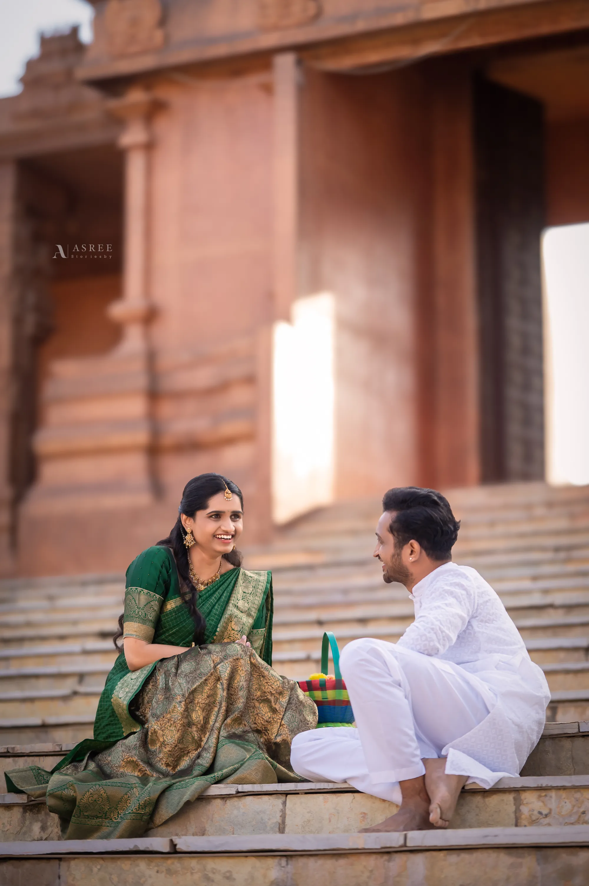 Bharath and Akhila laughing during their ceremony